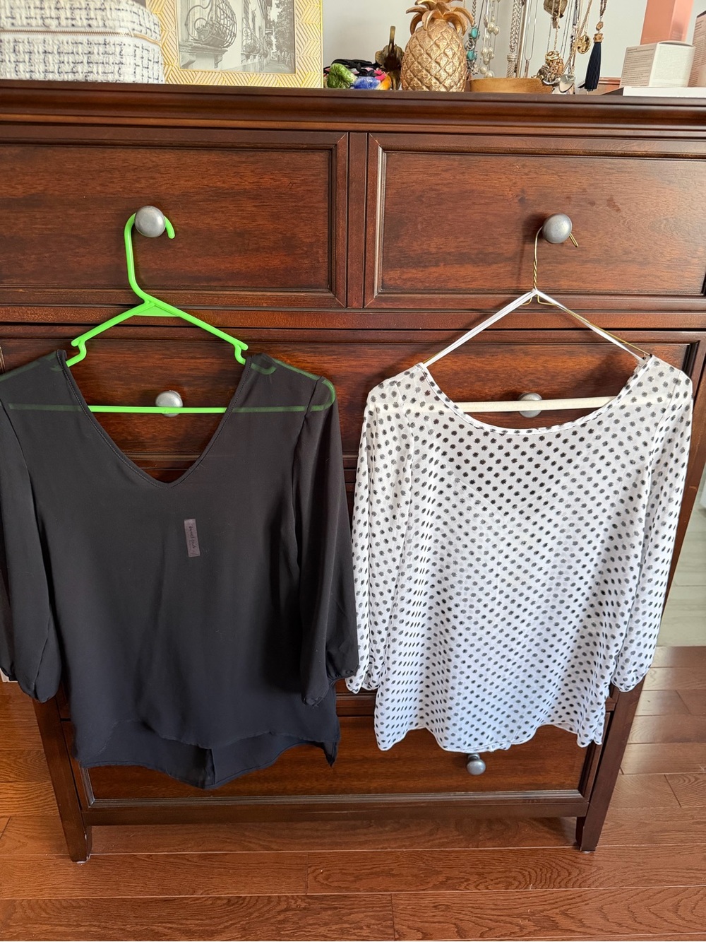 2 Lightweight Black & Black w/ White Polka Dot V-Neck Blouses w/ Bows in Back.